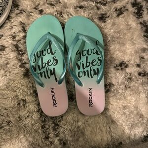 Turquoise flip flops